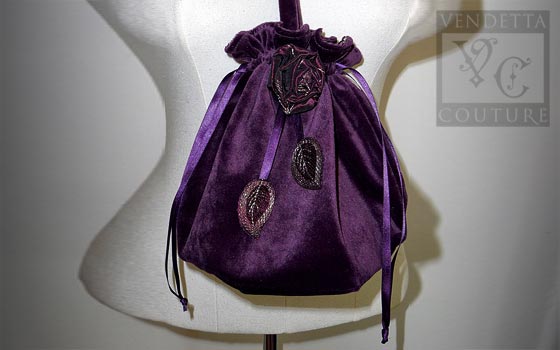 Plum bag with leaves and flowers